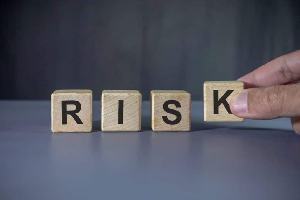 word risk in small wooden blocks