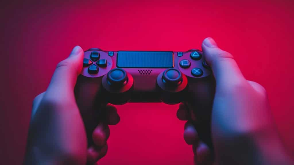 person holding a modern gaming controller